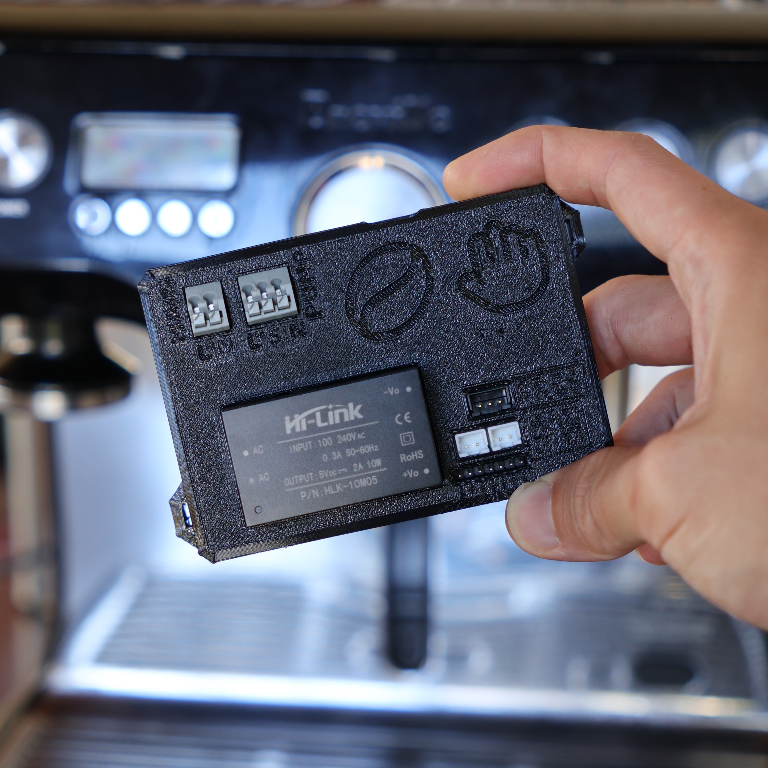 Bean Pounder control module in front of a Breville Dual Boiler