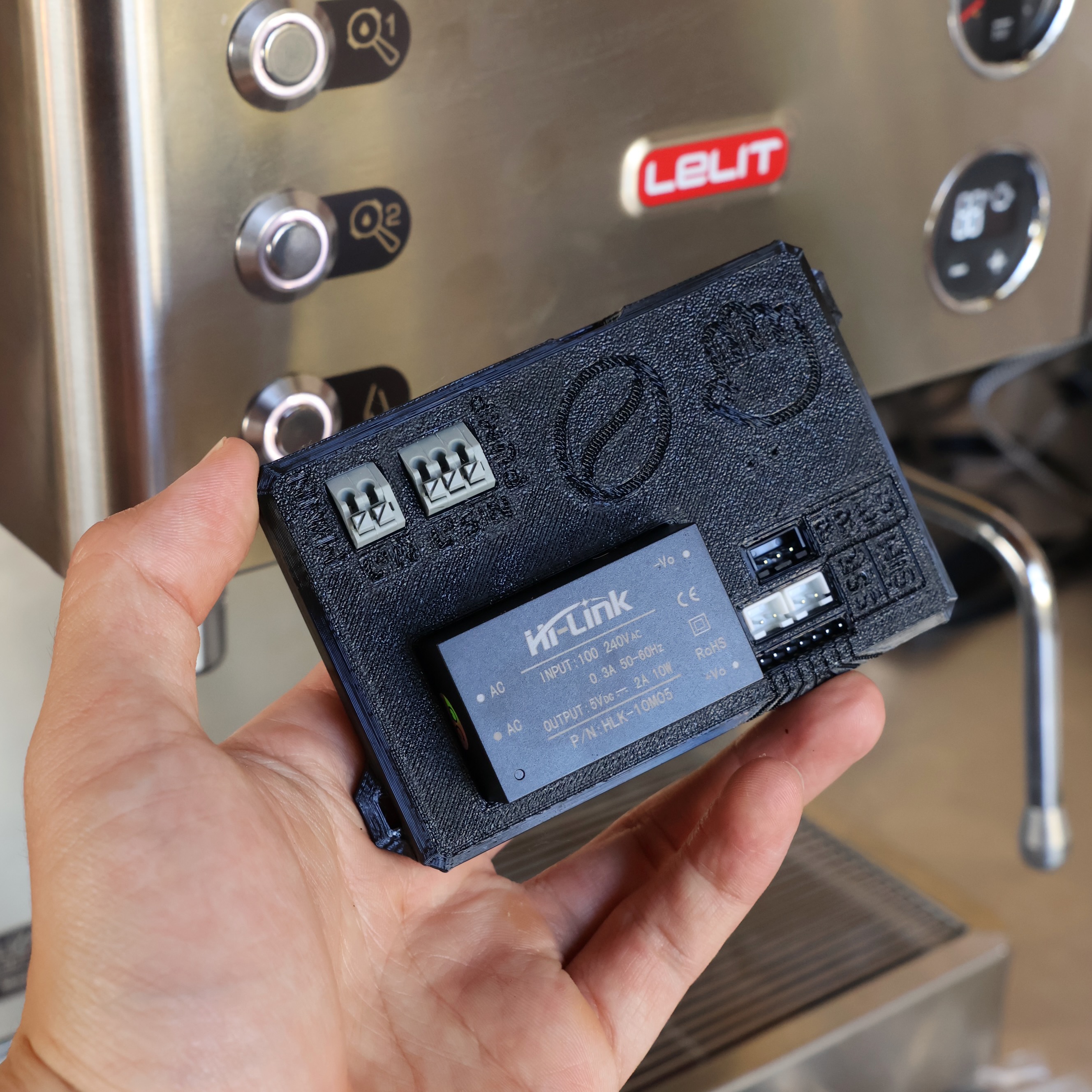 Bean Pounder control module in front of a Lelit Elizabeth espresso machine